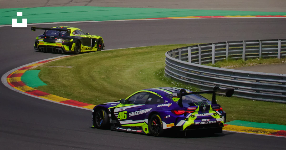 Two Cars Racing Track Two racing cars driving on a race track photo – Free Belgium Image on ...