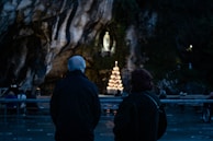 A quiet moment of reflection in a community center filled with hope and warmth.