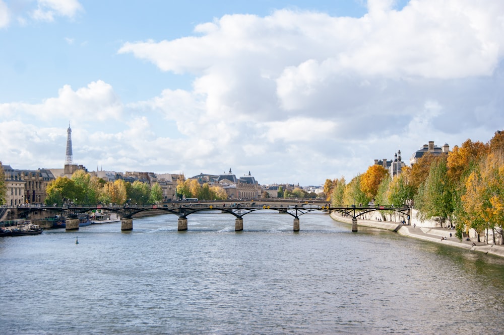 a bridge over a river in a city