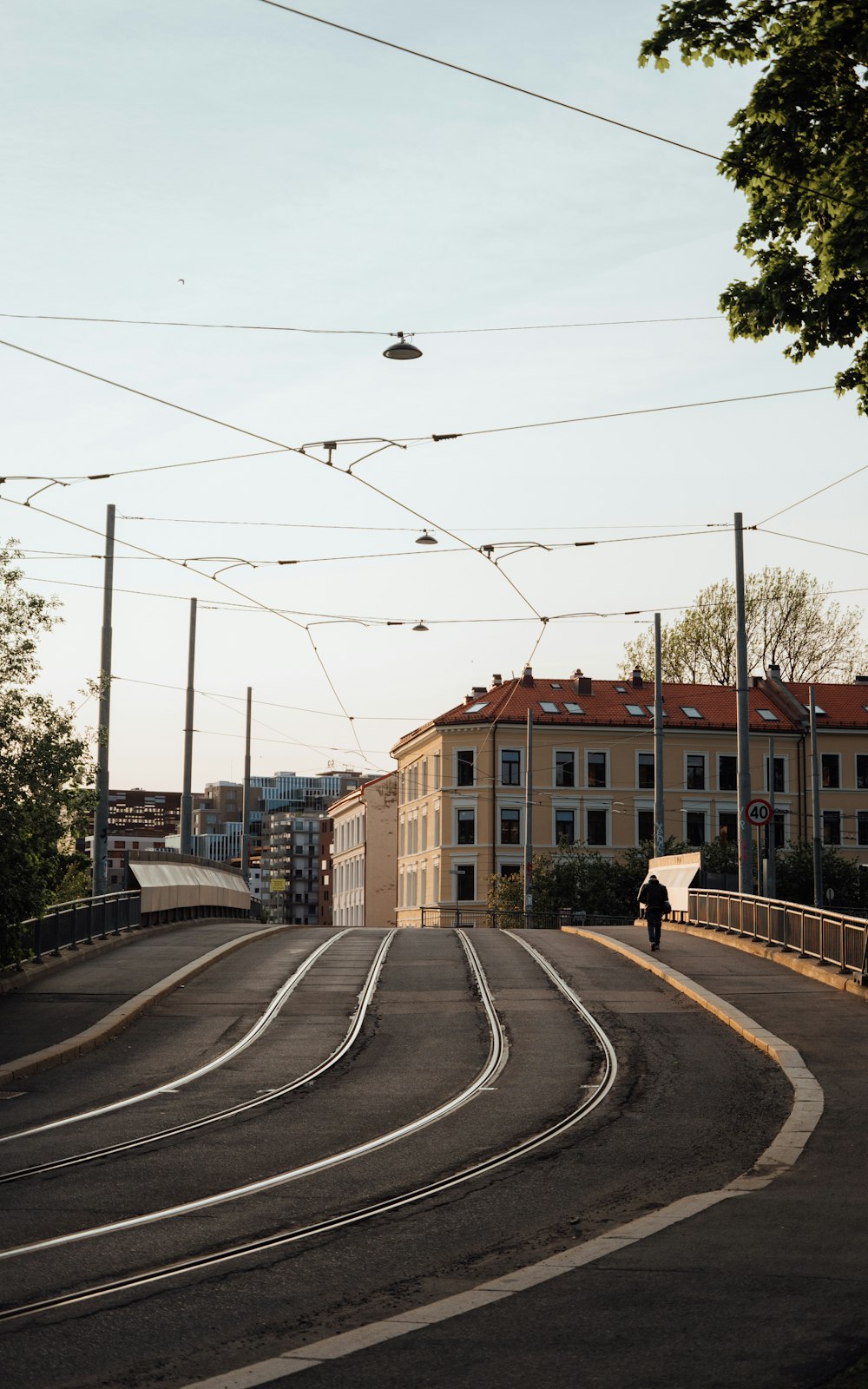 a person riding a bike on a city street