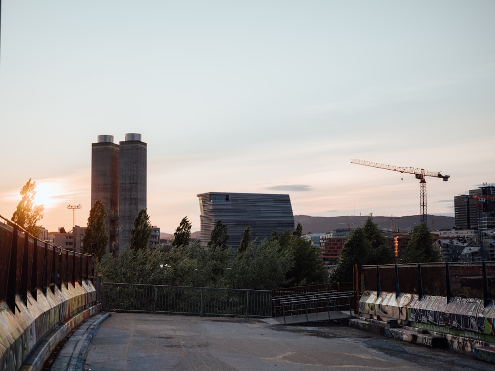 a view of a city with a crane in the background