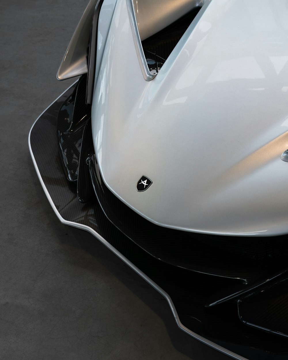 a close up of a white and black sports car