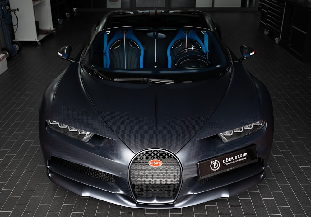 a bugatti sports car is shown in a garage