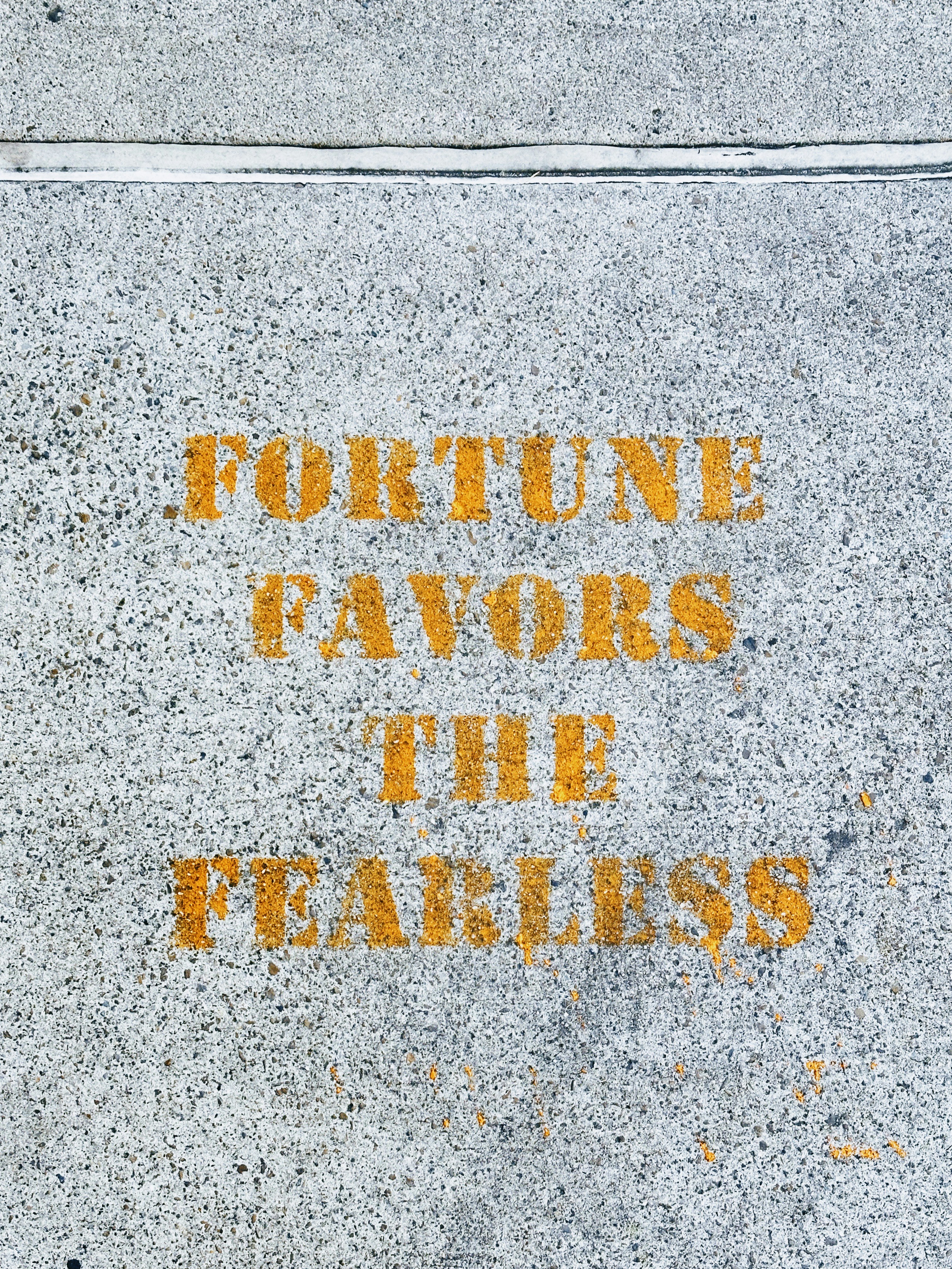 a sidewalk with a message written on it