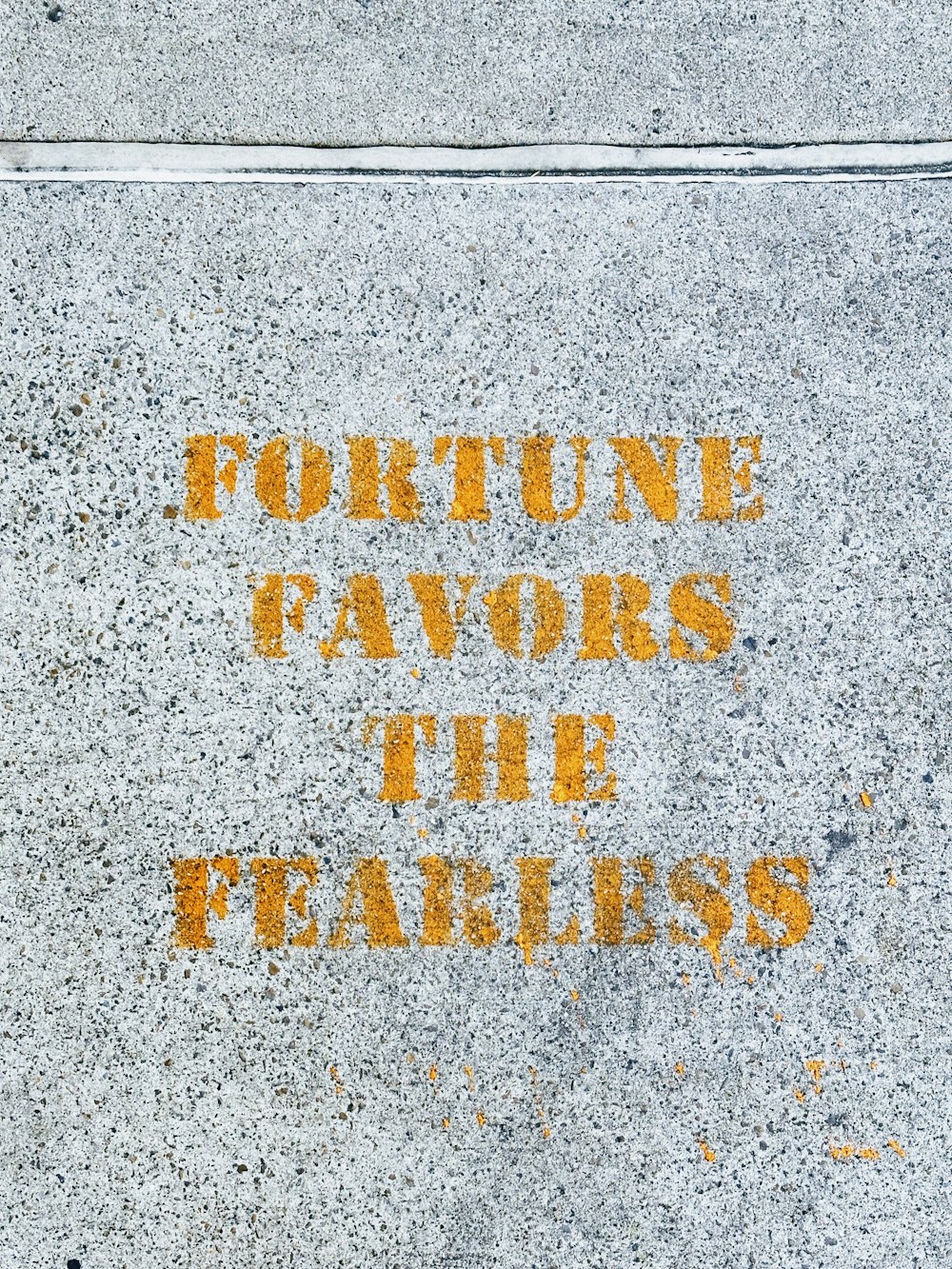 a sidewalk with a message written on it