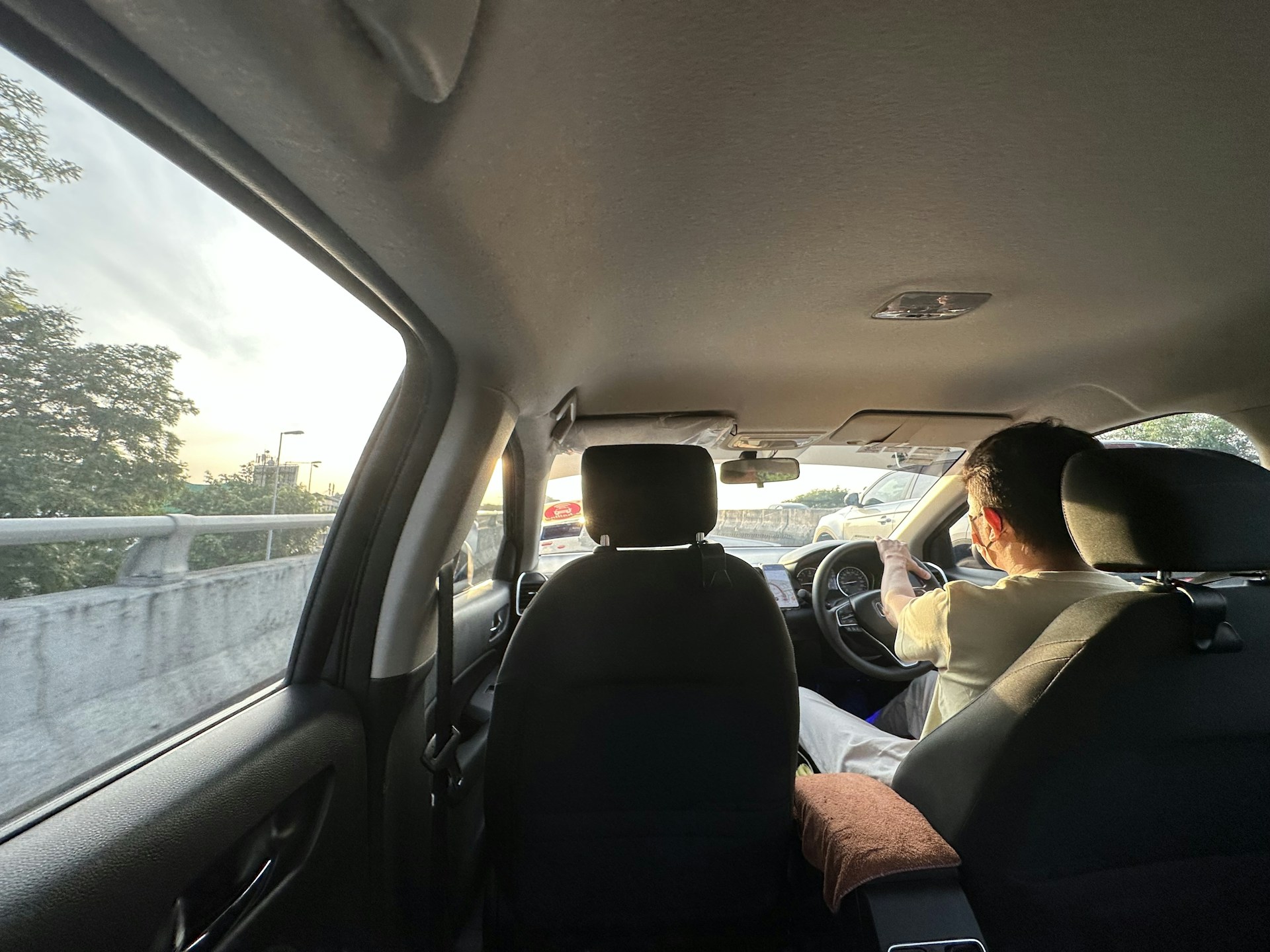 woman wearing yellow long-sleeved dress under white clouds and blue sky during daytime
