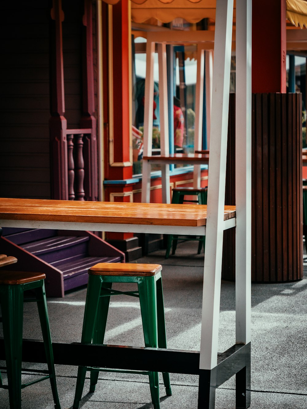 a group of wooden benches sitting next to each other