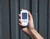 A close-up of a phone displaying the number (925) getsold.