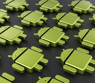 a group of green androids sitting next to each other