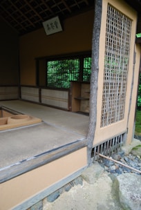 An inviting Korean-style tea room with traditional decor, softly lit and ready for a small group.