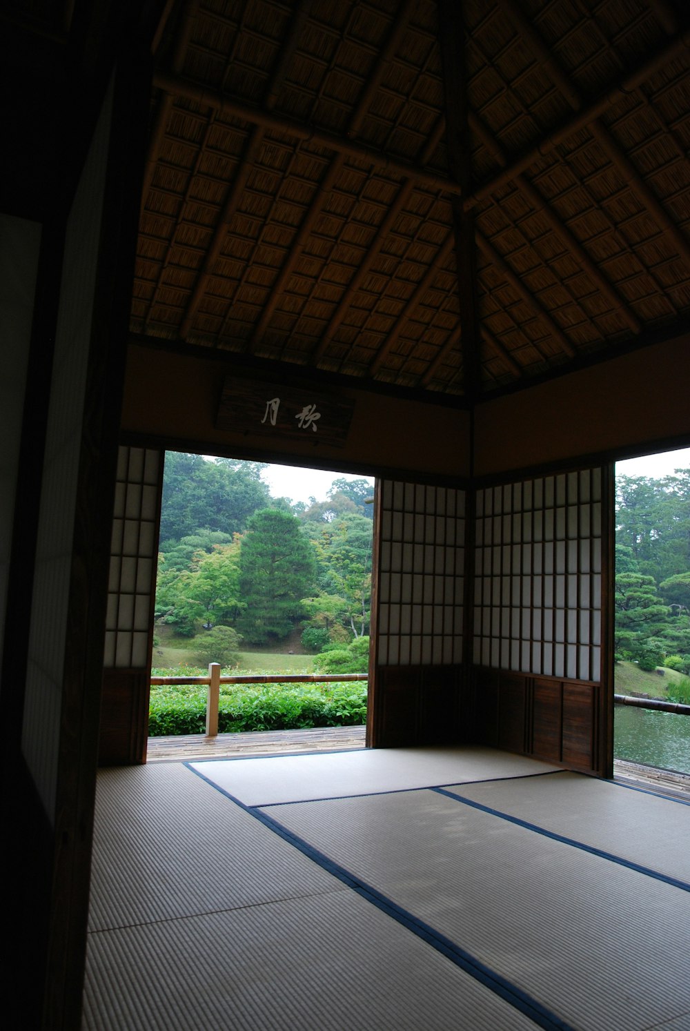 an open room with a view of a garden