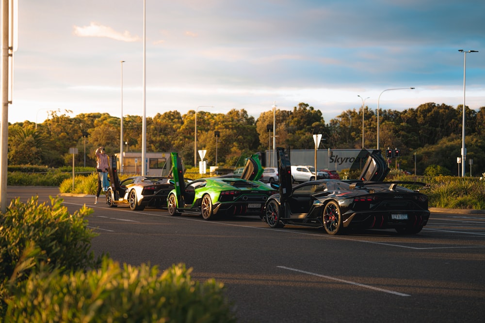 a group of cars parked next to each other in a parking lot