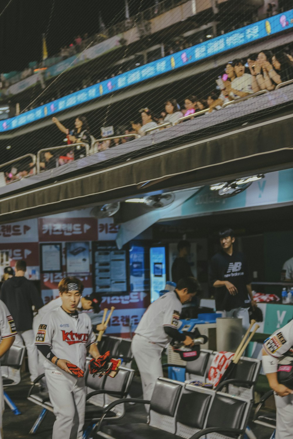 a group of baseball players standing next to each other