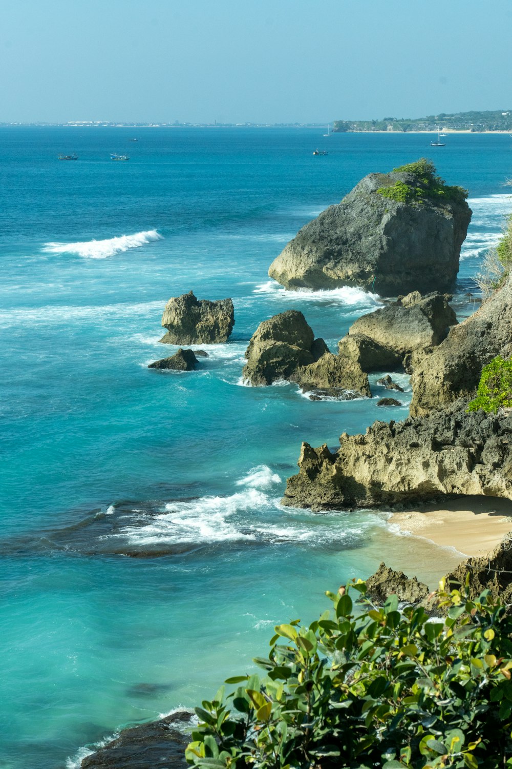 a view of the ocean from a cliff