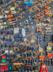Coils of electrical wires and switches displayed on a store rack.