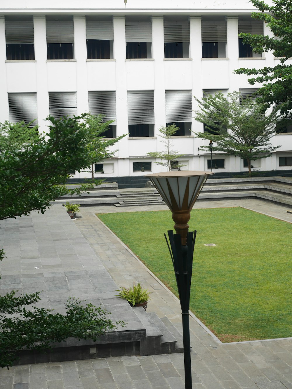 a view of a courtyard from a building