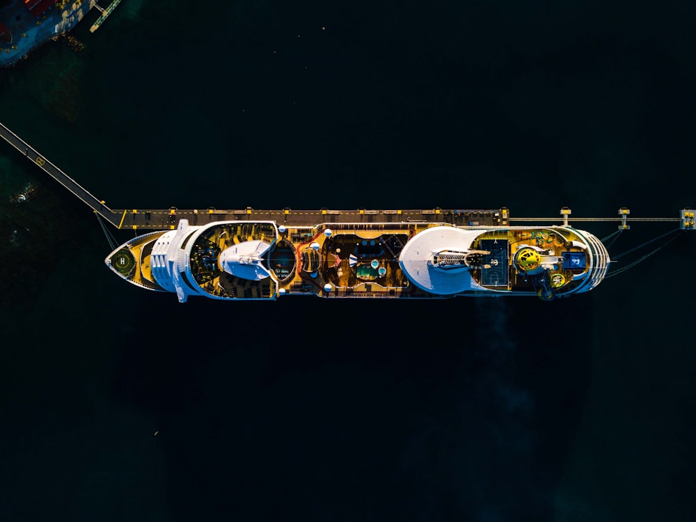 an aerial view of a cruise ship in the water