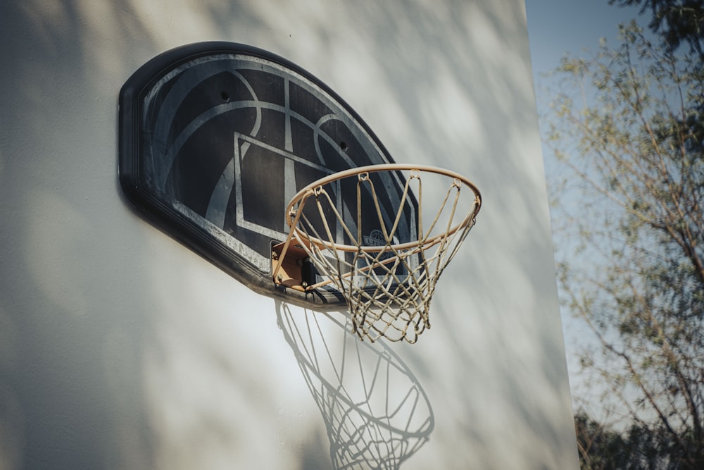 a basketball going through the rim of a basketball hoop