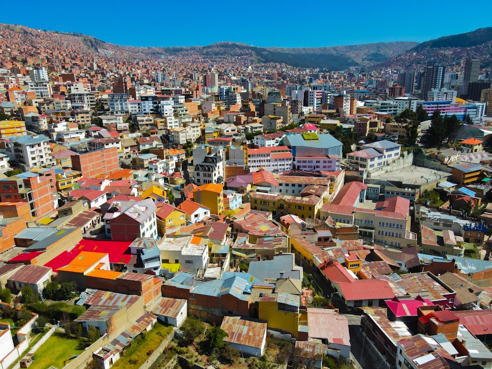 an aerial view of a city with colorful buildings