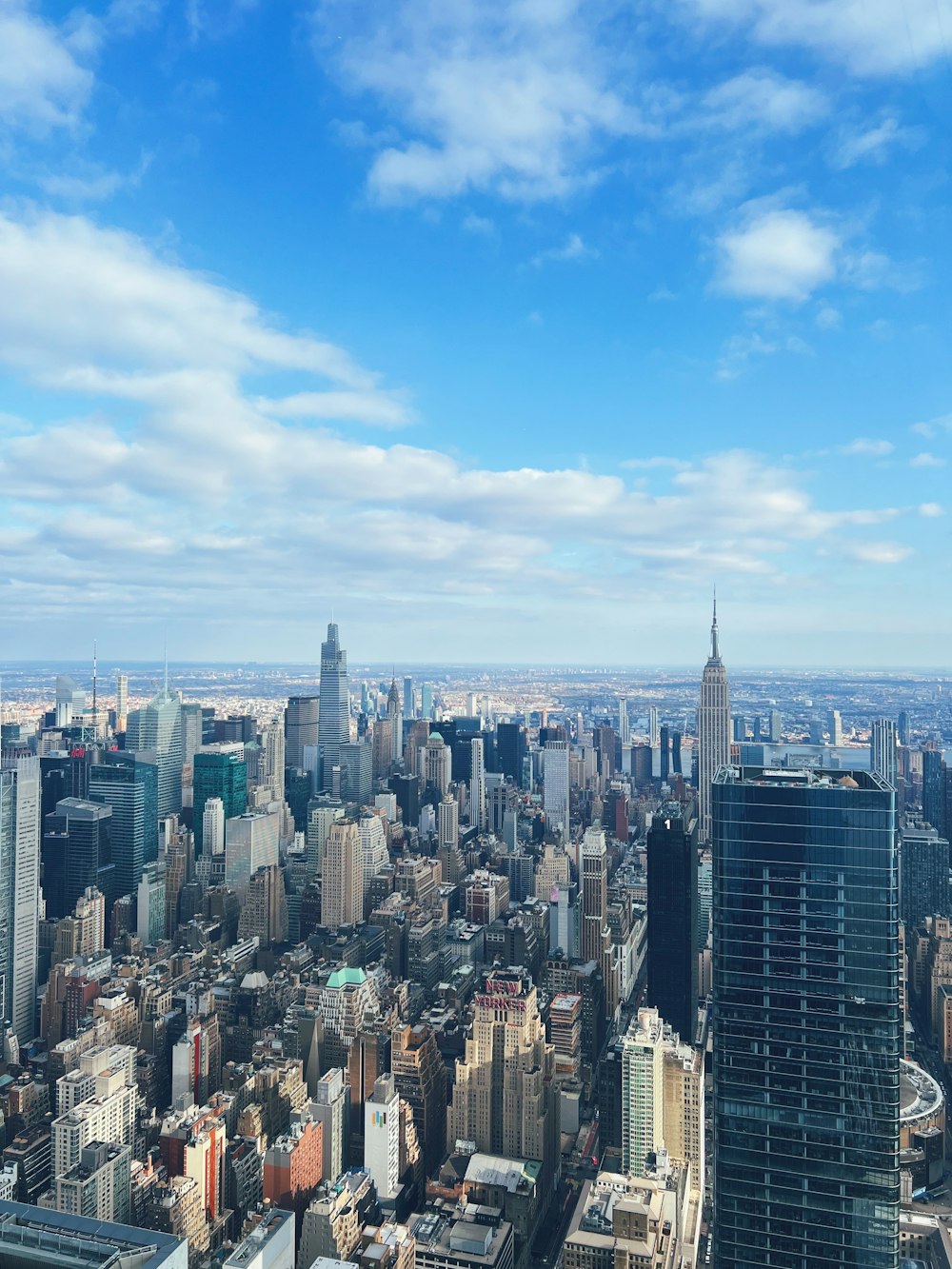 a view of a city from the top of a building