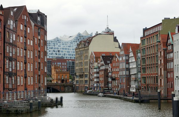 A river running through a city next to tall buildings — Hamburg, Germany