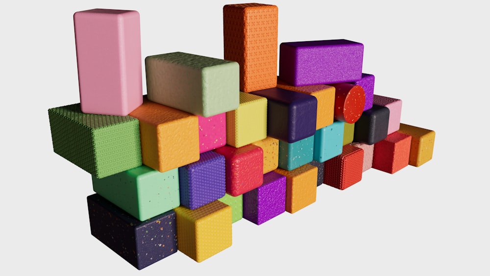 a bunch of different colored blocks stacked on top of each other