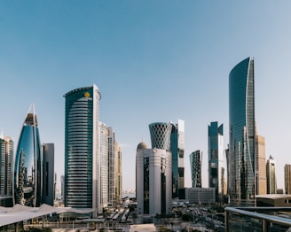 a group of tall buildings in a city