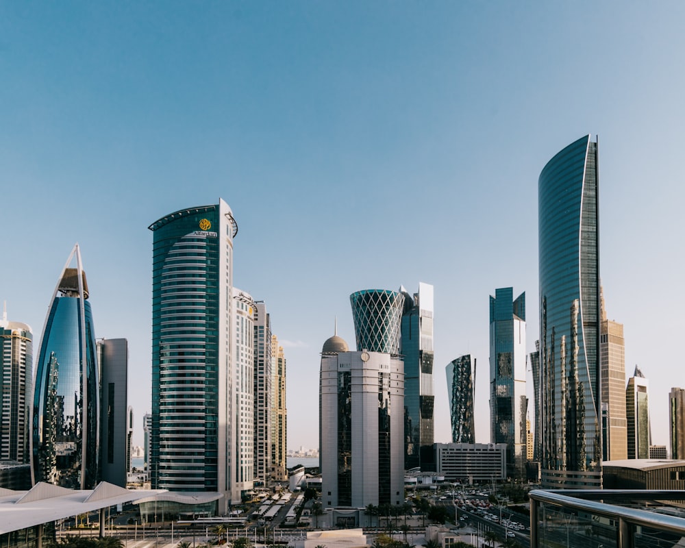 a group of tall buildings in a city