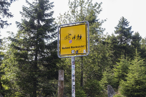 A close-up of a traffic sign emphasizing pedestrian caution.