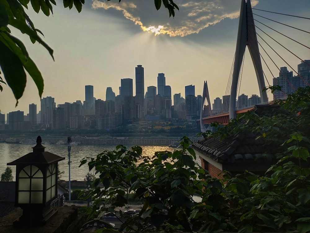 a view of a city and a bridge over a body of water