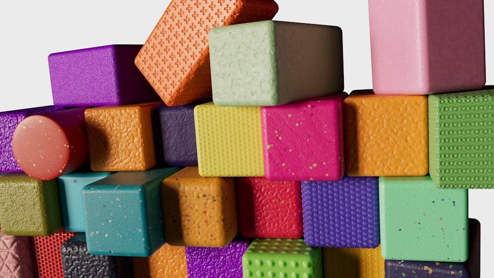 a pile of colorful blocks stacked on top of each other