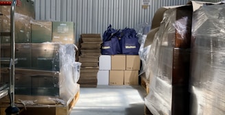 a warehouse filled with lots of boxes and bags
