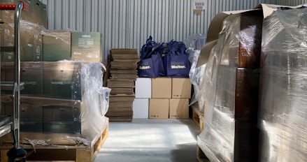 a warehouse filled with lots of boxes and bags