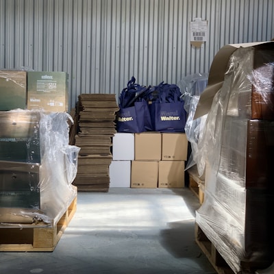a warehouse filled with lots of boxes and bags