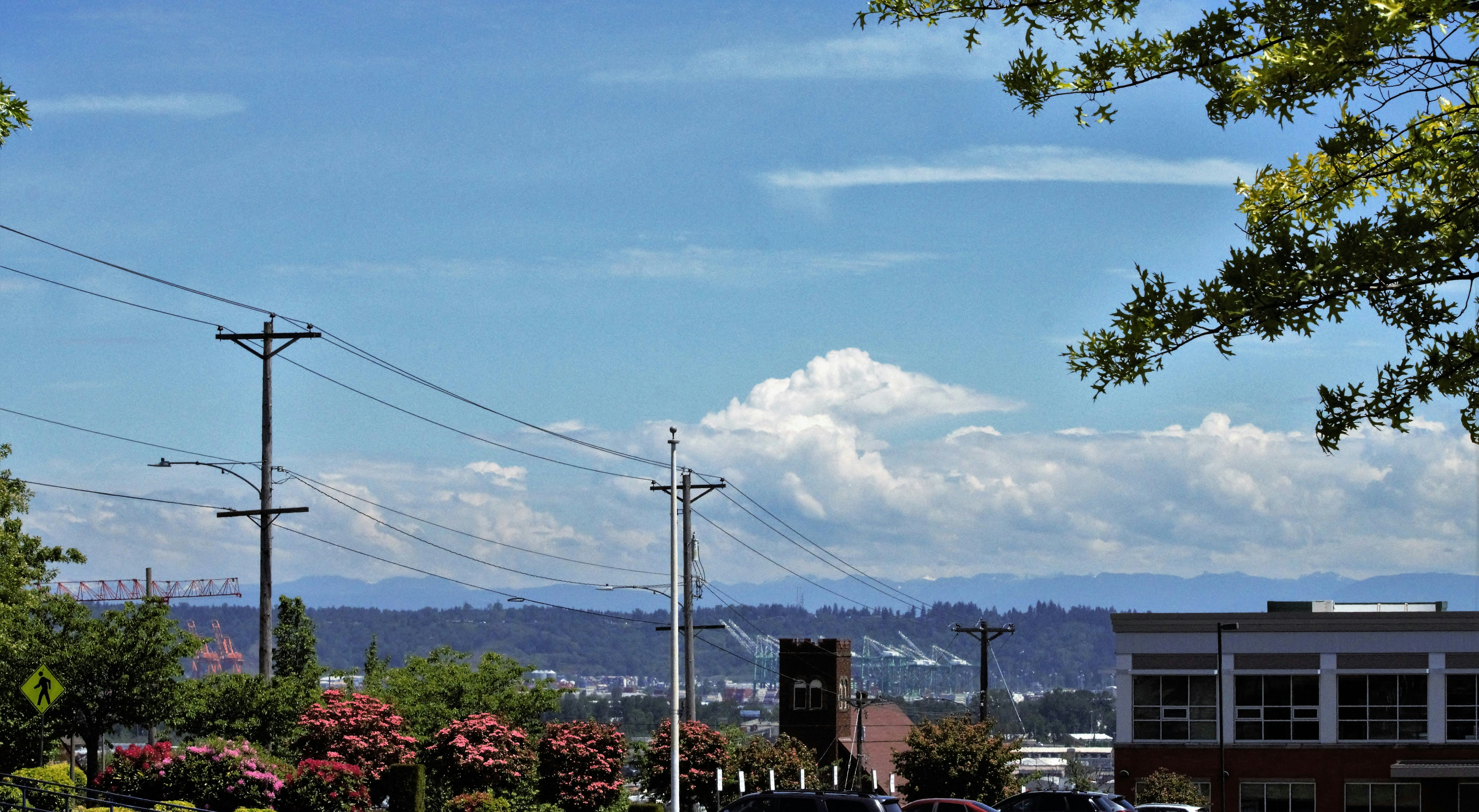 a street with cars parked on the side of it