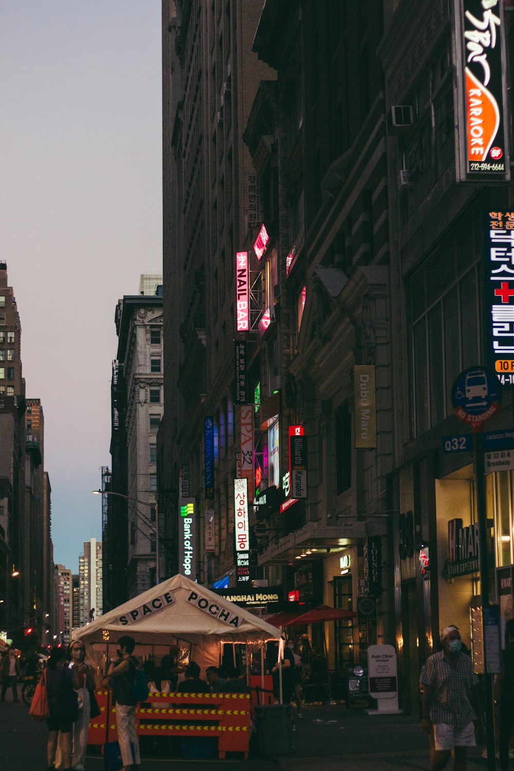 a small food cart on a city street