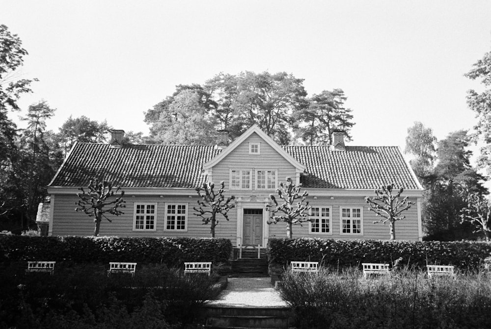 a black and white photo of a house