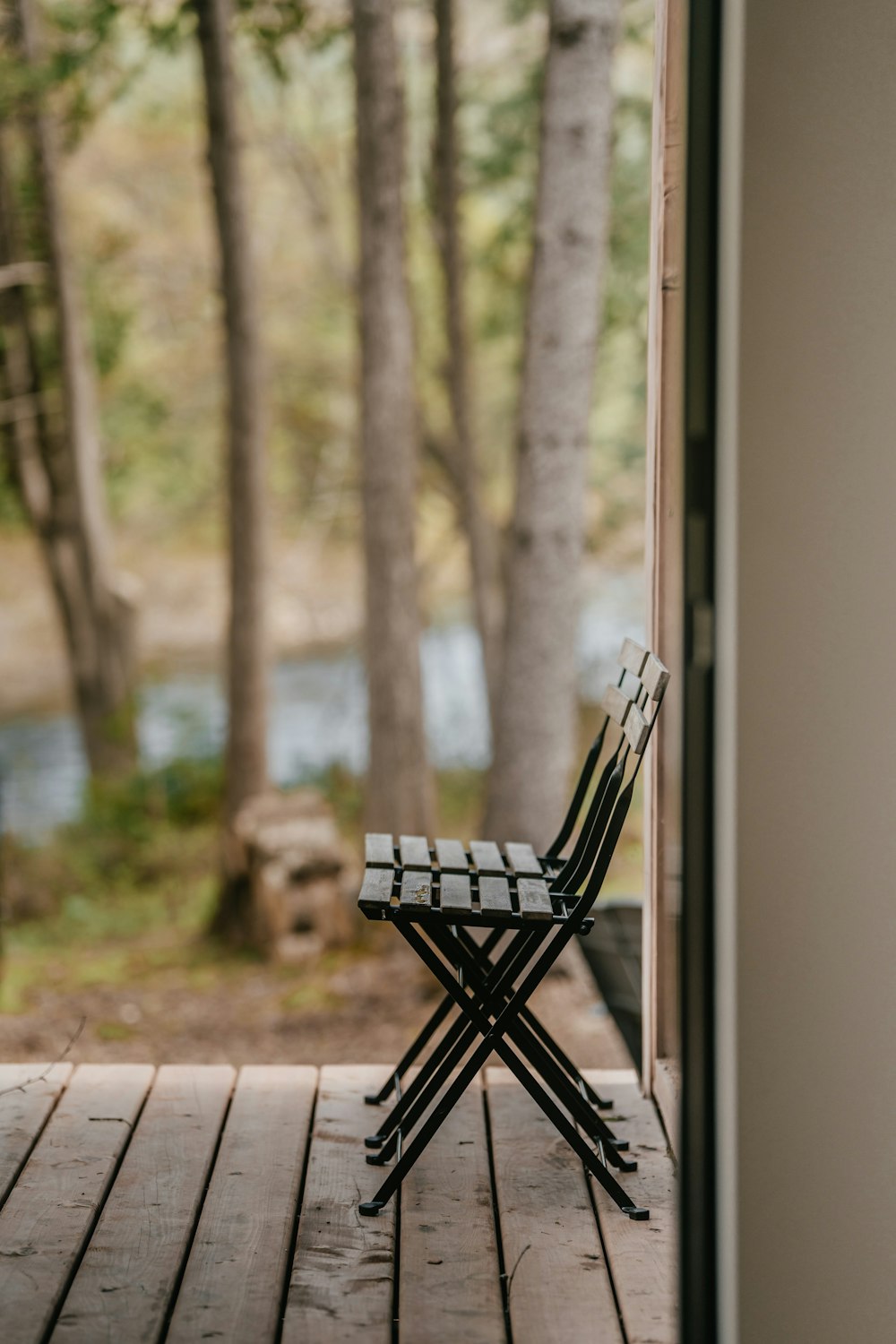 a chair sitting on top of a wooden deck