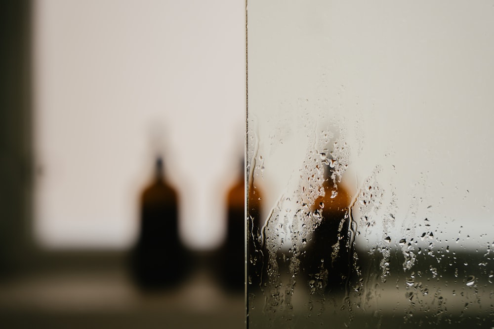 a close up of a window with rain drops