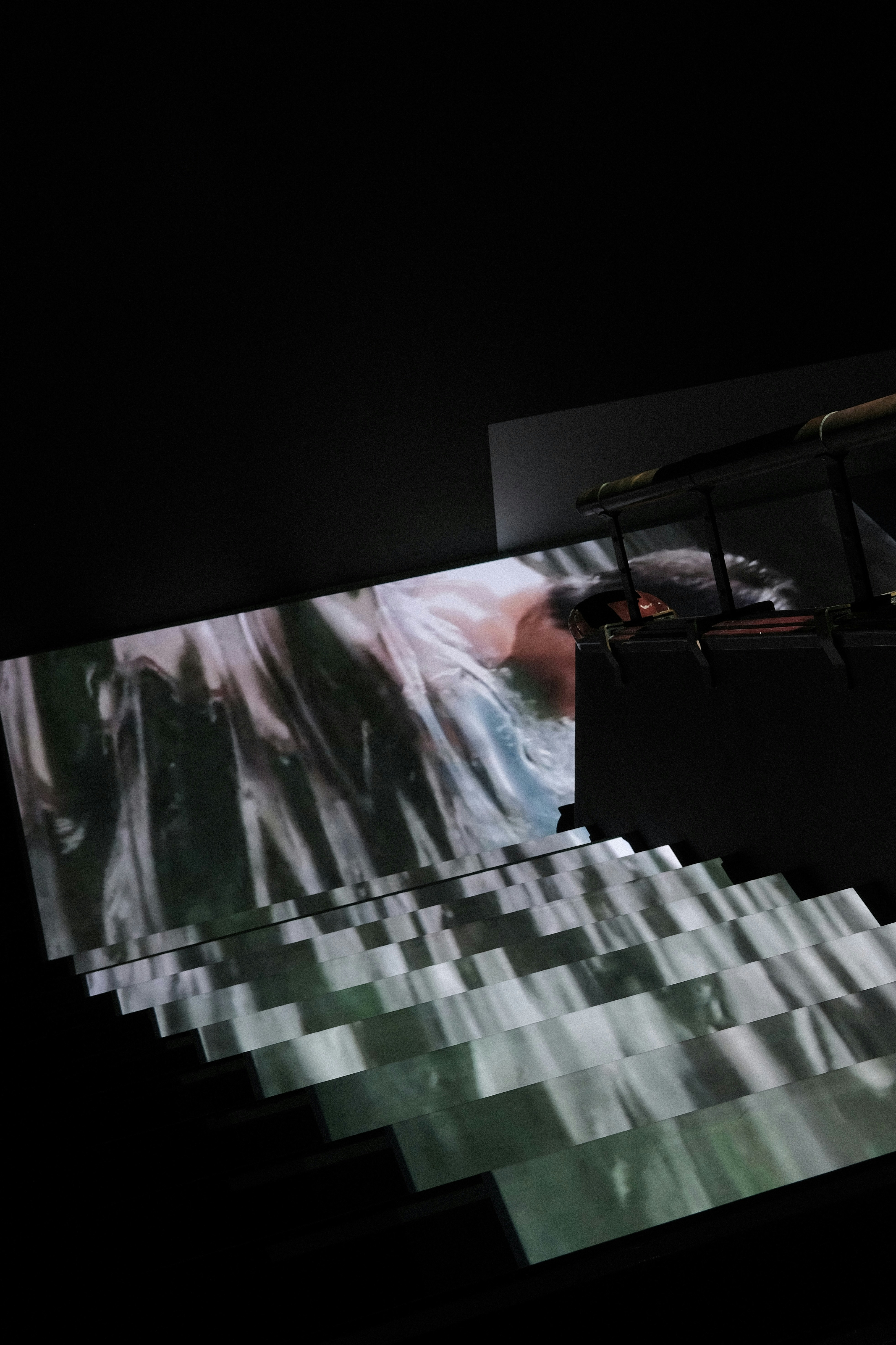 a large screen is projected on a wall