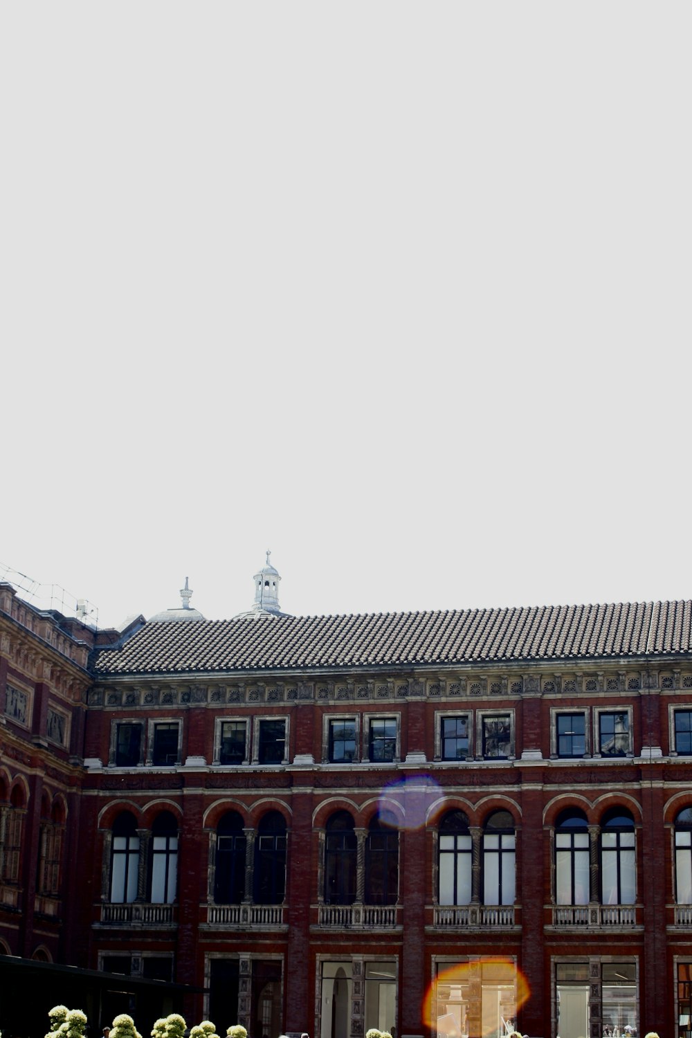 a large building with a clock on the front of it