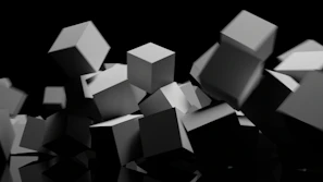 a black and white photo of a bunch of cubes