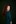 a woman with long red hair posing for a picture