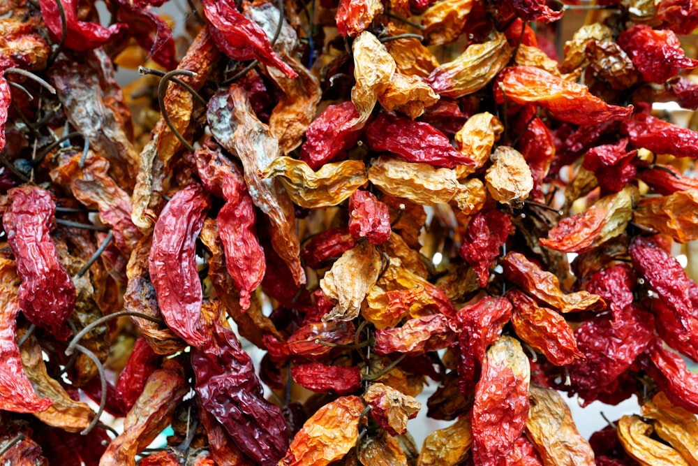 a pile of dried goji berries sitting on top of a table