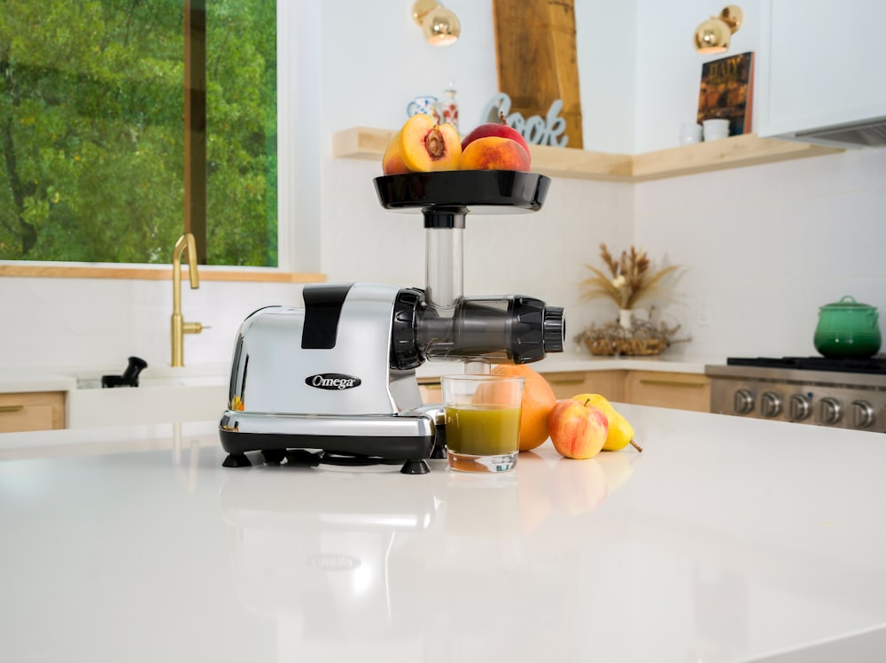 a blender sitting on top of a white counter