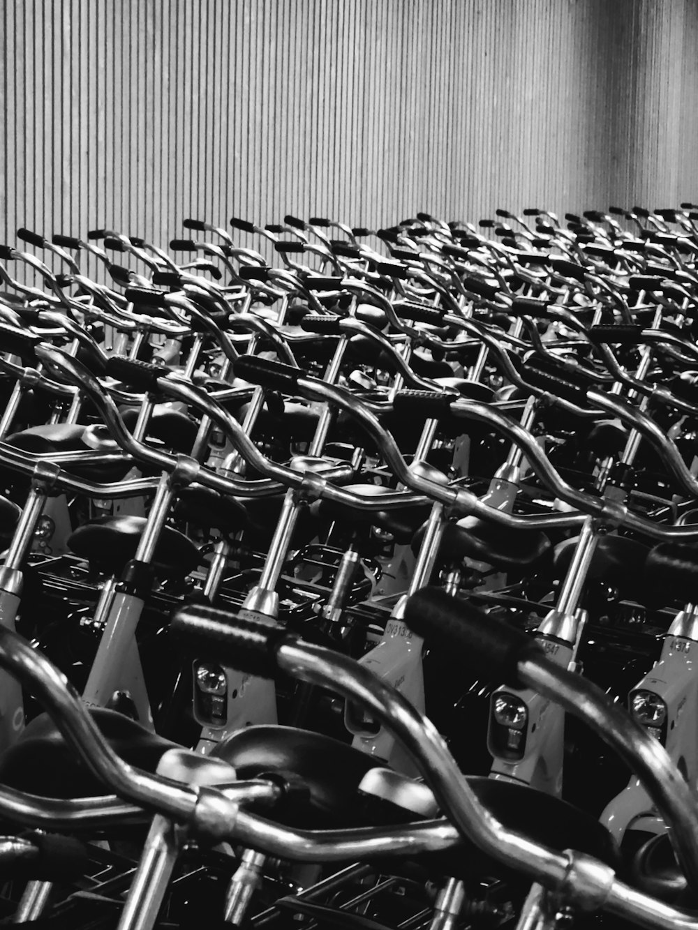 a row of bikes parked next to each other