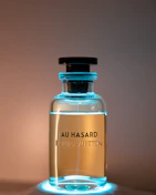 a bottle of perfume sitting on top of a table