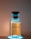 a bottle of perfume sitting on top of a table