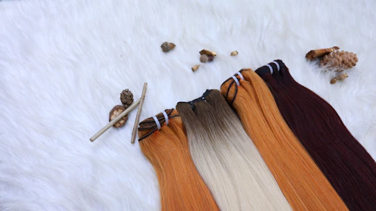 Close-up of luxurious, natural-looking hair extensions blending seamlessly with styled hair.