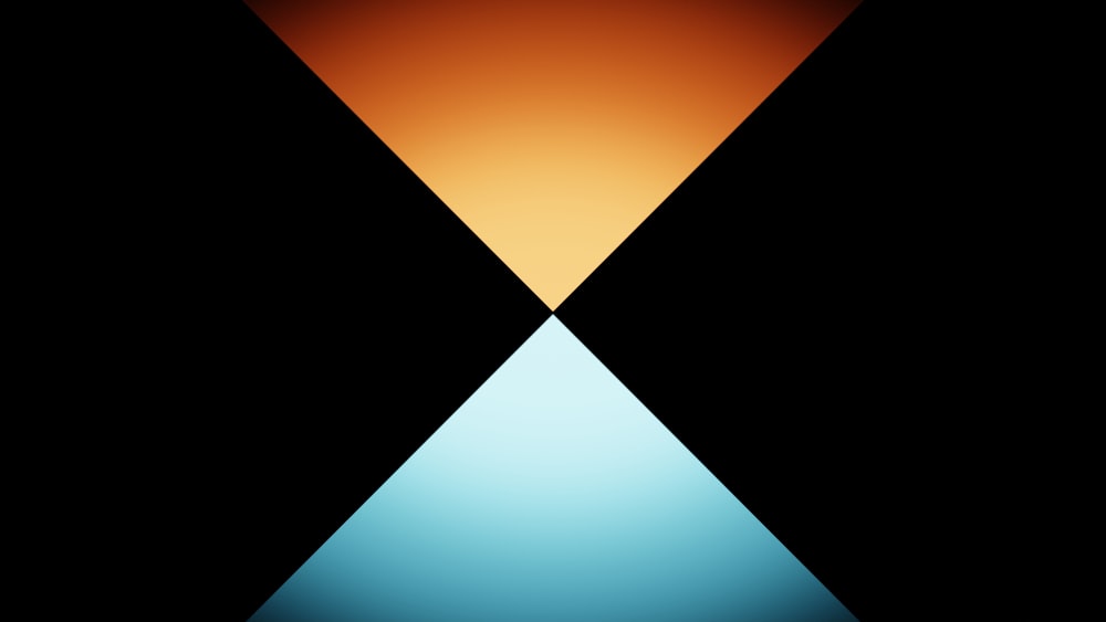 an orange and blue triangle on a black background